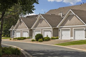 Each home features an attached garage with an automatic opener, along with driveway parking, providing secure parking and easy access to your home